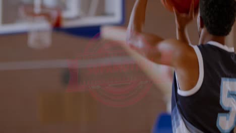 CU-Portrait-of-African-American-black-college-male-basketball-player-practicing-shots-alone-on-the-indoor-court.-4K-UHD-120-FPS-SLOW-MOTION-RAW-Graded-footage